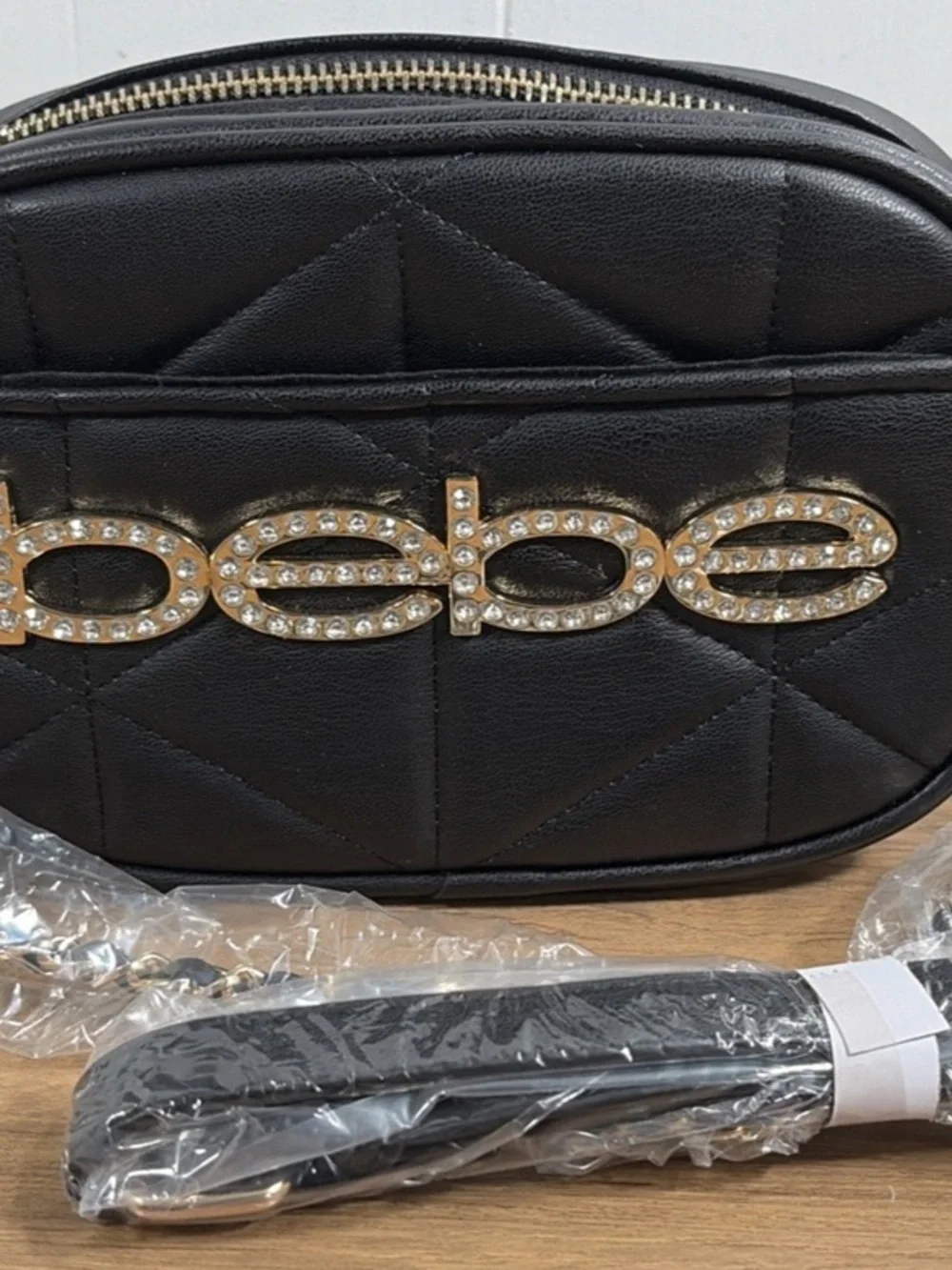 bebe Black Quilted Crossbody with Crystal Logo Plaque